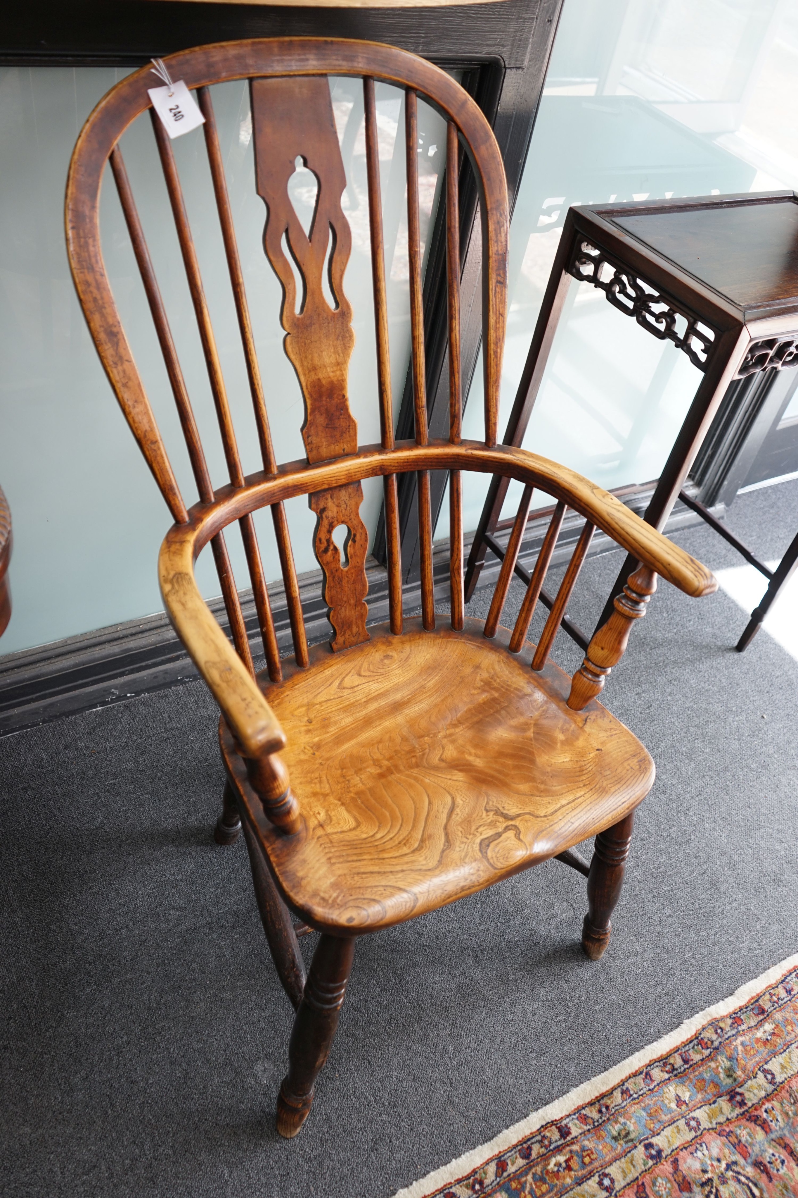 A Victorian elm and beech Windsor armchair, with fruit wood splat, width 56cm depth 40cm height 102cm